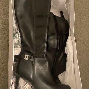 Brand new in box Calvin Klein boots. Size 9